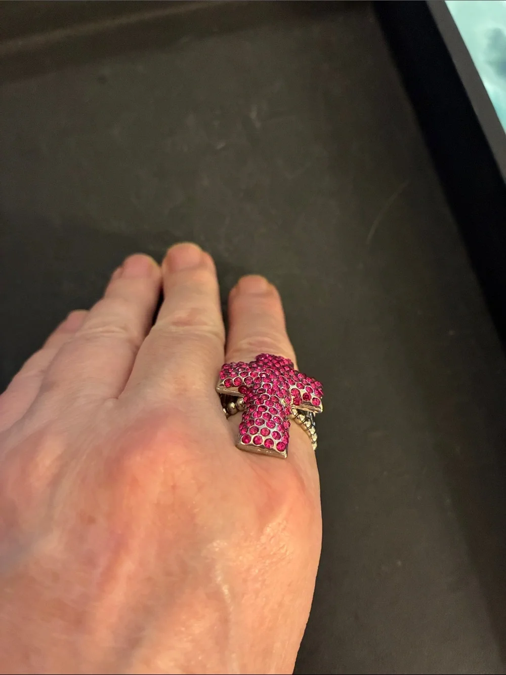 Pink Cross Statement Stretch Ring. Pink crystals encrust this cross ring. NWT